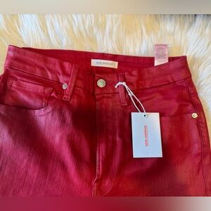 Good American red wax coated high waisted jeans